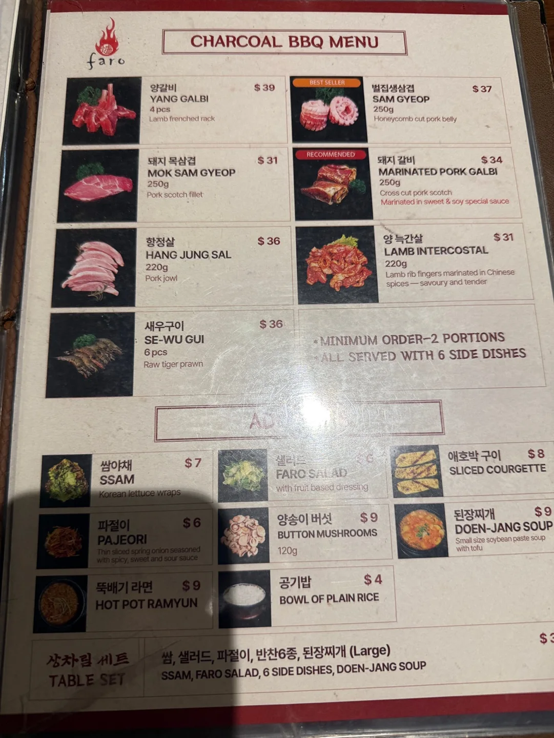 Faro CHARCOAL BBQ MENU 메뉴판. 양갈비, 벌집생삼겹, 돼지 목삼겹, 돼지갈비, 항정살, 양 늑간살, 새우구이와 추가 메뉴가 사진과 함께 적혀 있다